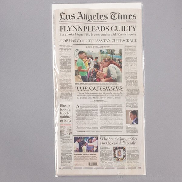 Newspaper Sleeve. Holds current-day